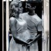 Rectangular photo crystal featuring an expecting couple holding the woman's stomach together